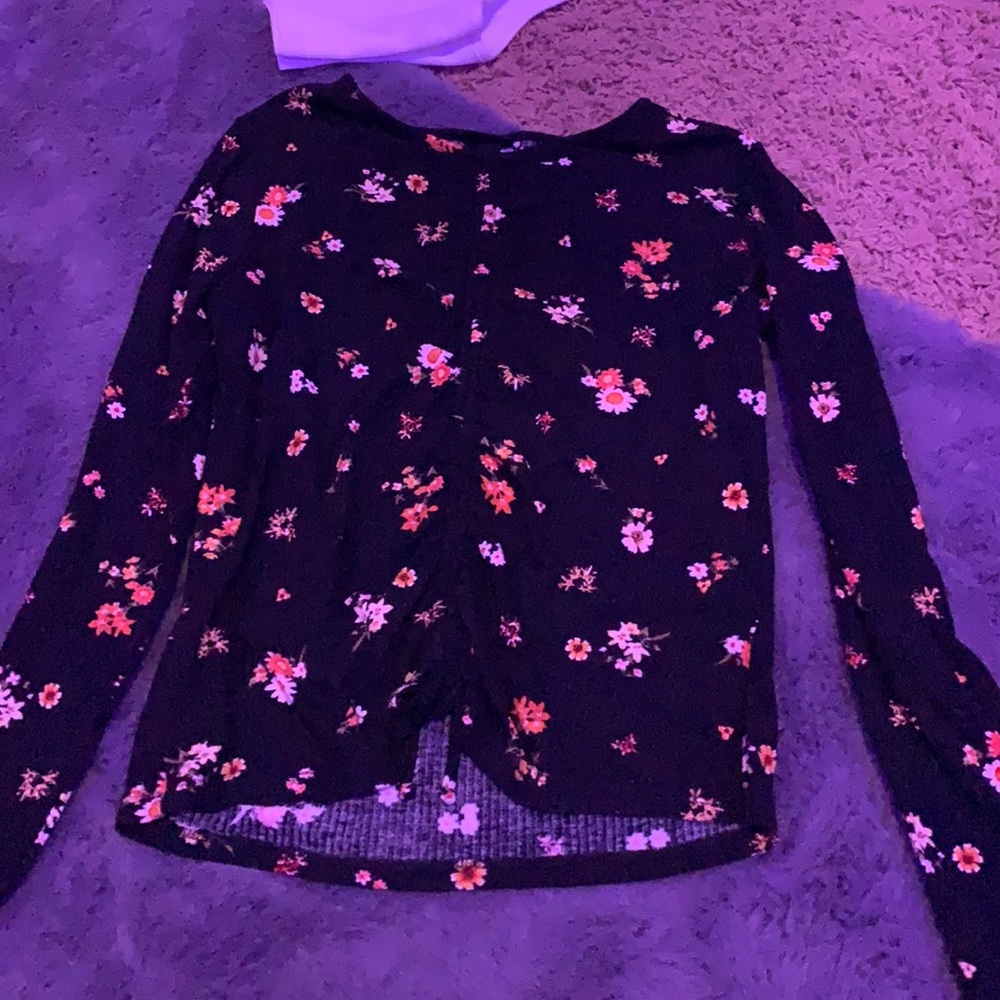 I’m selling a long sleeved flowered shirt!